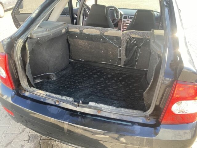 Черный ВАЗ 2172 Priora, объемом двигателя 1.6 л и пробегом 134 тыс. км за 2000 $, фото 13 на Automoto.ua