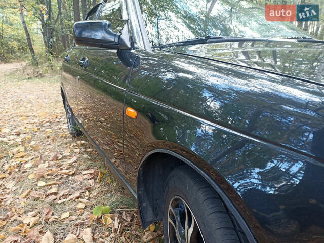 Черный ВАЗ 2172 Priora, объемом двигателя 1.6 л и пробегом 185 тыс. км за 3000 $, фото 2 на Automoto.ua