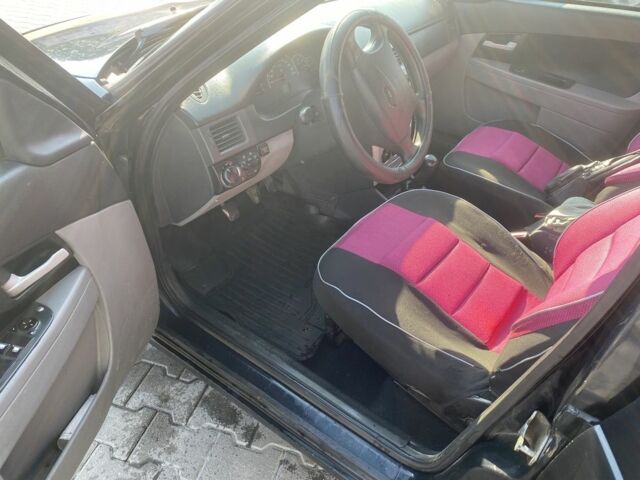 Черный ВАЗ 2172 Priora, объемом двигателя 1.6 л и пробегом 134 тыс. км за 2000 $, фото 12 на Automoto.ua