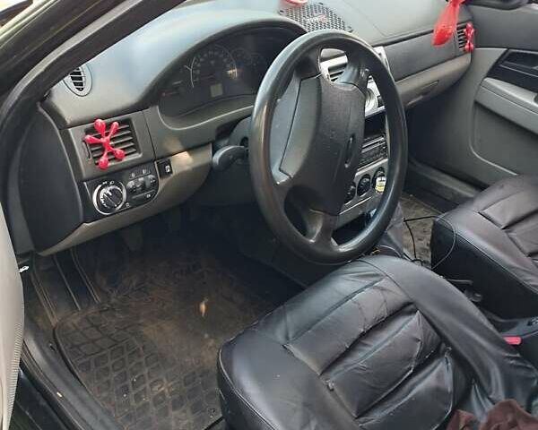 Черный ВАЗ 2172 Priora, объемом двигателя 1.6 л и пробегом 423 тыс. км за 2850 $, фото 4 на Automoto.ua