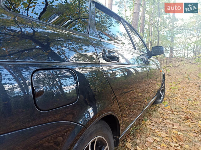 Черный ВАЗ 2172 Priora, объемом двигателя 1.6 л и пробегом 185 тыс. км за 2899 $, фото 5 на Automoto.ua