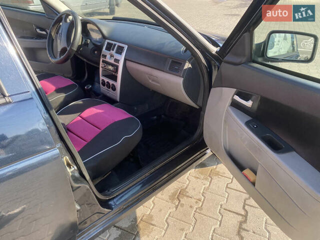 Черный ВАЗ 2172 Priora, объемом двигателя 1.6 л и пробегом 130 тыс. км за 2000 $, фото 23 на Automoto.ua