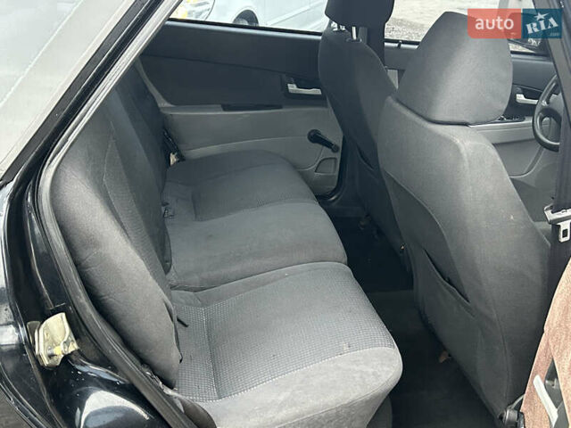 Чорний ВАЗ 2172 Priora, об'ємом двигуна 1.6 л та пробігом 146 тис. км за 1850 $, фото 17 на Automoto.ua