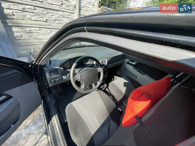 Черный ВАЗ 2172 Priora, объемом двигателя 1.6 л и пробегом 162 тыс. км за 3000 $, фото 11 на Automoto.ua