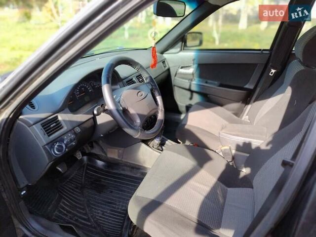 ВАЗ 2172 Priora 2009 в Новом Буге на Automoto.ua Черный ВАЗ 2172 Priora, объемом двигателя 1.6 л и пробегом 340 тыс. км за 2560 $, фото 11 на Automoto.ua