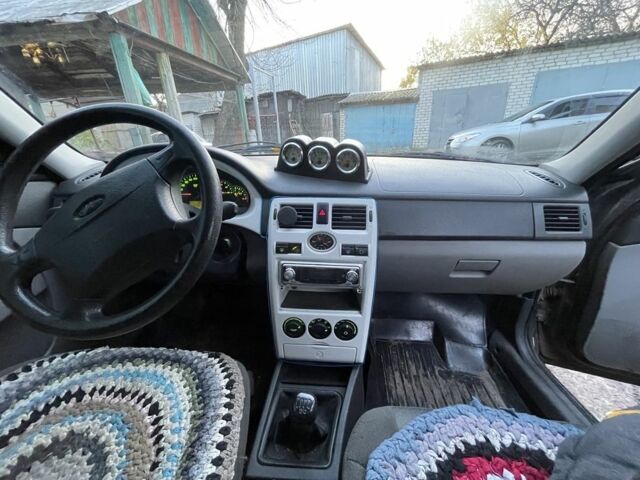 Черный ВАЗ 2172 Priora, объемом двигателя 1.6 л и пробегом 183 тыс. км за 1850 $, фото 9 на Automoto.ua