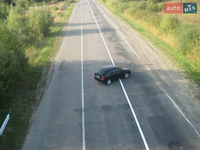 Черный ВАЗ 2172 Priora, объемом двигателя 1.6 л и пробегом 142 тыс. км за 1900 $, фото 8 на Automoto.ua
