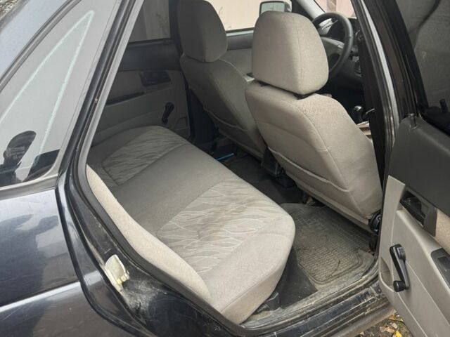 Черный ВАЗ 2172 Priora, объемом двигателя 1.6 л и пробегом 2 тыс. км за 2600 $, фото 5 на Automoto.ua