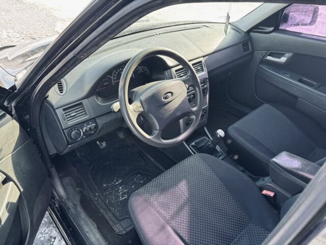 Черный ВАЗ 2172 Priora, объемом двигателя 1.6 л и пробегом 300 тыс. км за 1999 $, фото 6 на Automoto.ua