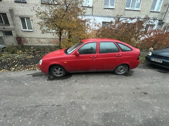Красный ВАЗ 2172 Priora, объемом двигателя 1.6 л и пробегом 250 тыс. км за 1668 $, фото 1 на Automoto.ua