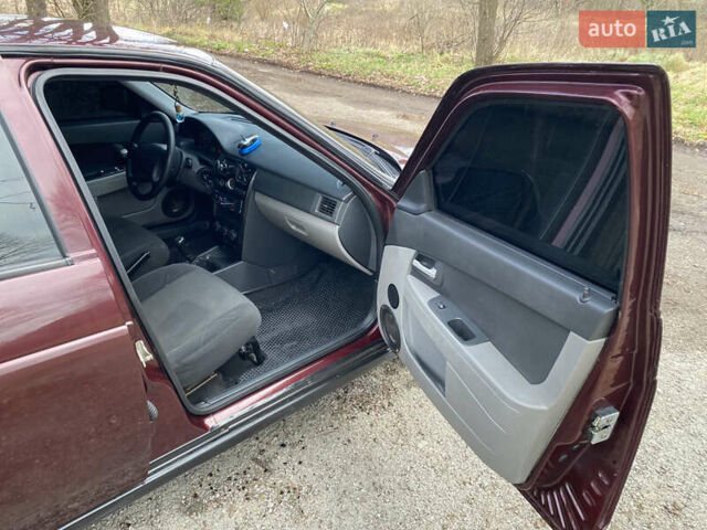 Красный ВАЗ 2172 Priora, объемом двигателя 1.6 л и пробегом 210 тыс. км за 2150 $, фото 11 на Automoto.ua