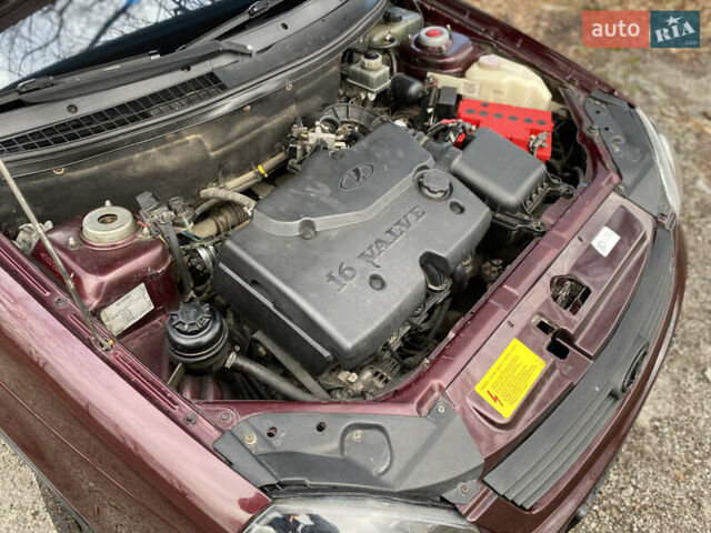 Красный ВАЗ 2172 Priora, объемом двигателя 1.6 л и пробегом 210 тыс. км за 2150 $, фото 19 на Automoto.ua