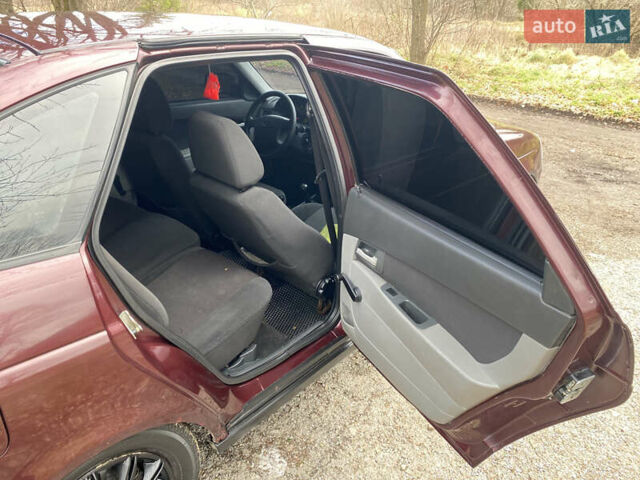 Красный ВАЗ 2172 Priora, объемом двигателя 1.6 л и пробегом 210 тыс. км за 2150 $, фото 10 на Automoto.ua