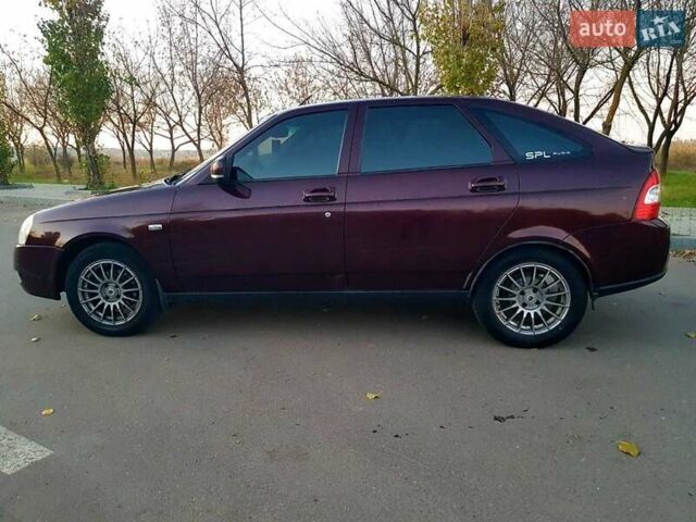 Красный ВАЗ 2172 Priora, объемом двигателя 1.6 л и пробегом 220 тыс. км за 3900 $, фото 3 на Automoto.ua