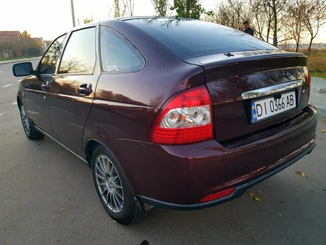 Красный ВАЗ 2172 Priora, объемом двигателя 1.6 л и пробегом 220 тыс. км за 3900 $, фото 3 на Automoto.ua