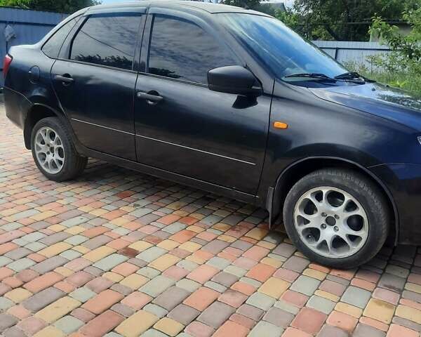 Чорний ВАЗ 2190 Гранта, об'ємом двигуна 1.6 л та пробігом 108 тис. км за 3000 $, фото 1 на Automoto.ua