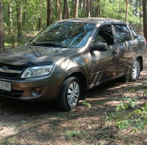 Коричневый ВАЗ 2190 Гранта, объемом двигателя 1.6 л и пробегом 126 тыс. км за 3500 $, фото 2 на Automoto.ua