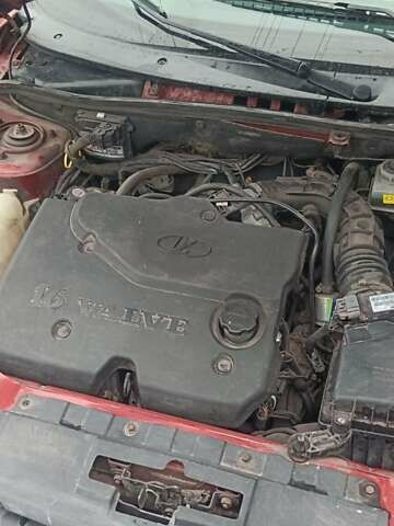 Красный ВАЗ 2190 Гранта, объемом двигателя 1.6 л и пробегом 155 тыс. км за 2550 $, фото 8 на Automoto.ua