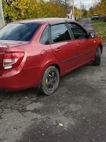 Красный ВАЗ 2190 Гранта, объемом двигателя 1.6 л и пробегом 155 тыс. км за 2550 $, фото 3 на Automoto.ua