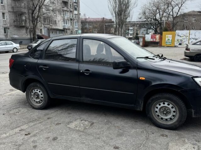 Черный ВАЗ Гранта, объемом двигателя 1.6 л и пробегом 257 тыс. км за 2750 $, фото 2 на Automoto.ua