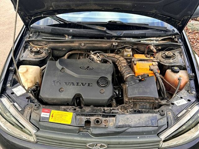 Черный ВАЗ Kalina, объемом двигателя 1.4 л и пробегом 134 тыс. км за 2200 $, фото 7 на Automoto.ua