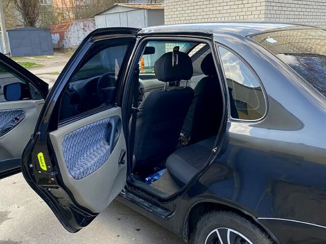 Чорний ВАЗ Kalina, об'ємом двигуна 1.4 л та пробігом 150 тис. км за 2000 $, фото 8 на Automoto.ua