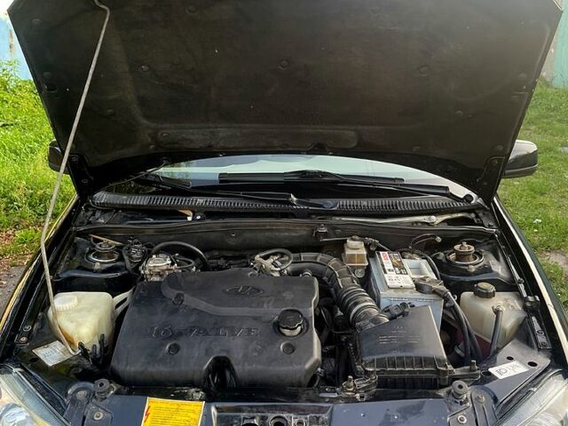 Чорний ВАЗ Kalina, об'ємом двигуна 1.4 л та пробігом 145 тис. км за 3900 $, фото 11 на Automoto.ua