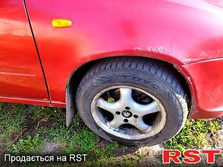 Червоний ВАЗ Kalina, об'ємом двигуна 1.6 л та пробігом 207 тис. км за 1300 $, фото 2 на Automoto.ua