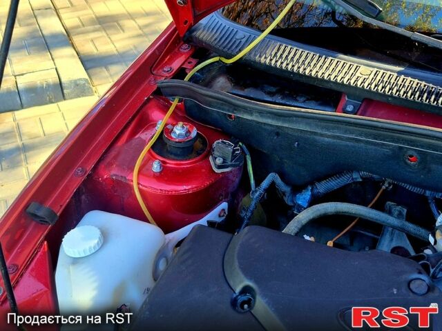 Красный ВАЗ Kalina, объемом двигателя 1.4 л и пробегом 220 тыс. км за 1450 $, фото 6 на Automoto.ua