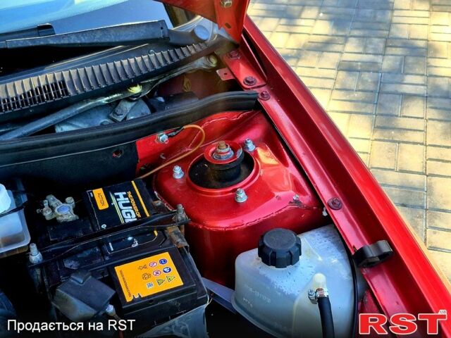 Красный ВАЗ Kalina, объемом двигателя 1.4 л и пробегом 220 тыс. км за 1450 $, фото 5 на Automoto.ua