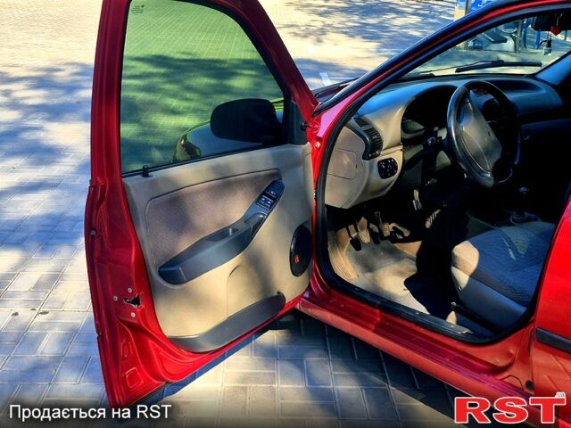 Красный ВАЗ Kalina, объемом двигателя 1.4 л и пробегом 220 тыс. км за 1450 $, фото 3 на Automoto.ua