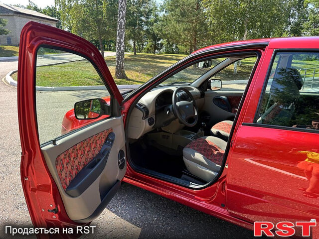 Красный ВАЗ Kalina, объемом двигателя 1.4 л и пробегом 32 тыс. км за 3650 $, фото 8 на Automoto.ua