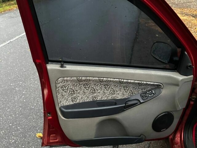 Красный ВАЗ Калина, объемом двигателя 1.6 л и пробегом 150 тыс. км за 2200 $, фото 13 на Automoto.ua