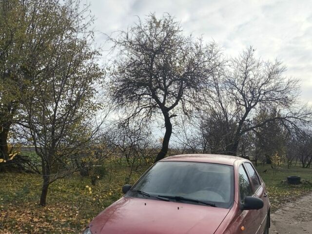 Красный ВАЗ Калина, объемом двигателя 1.6 л и пробегом 130 тыс. км за 1000 $, фото 5 на Automoto.ua