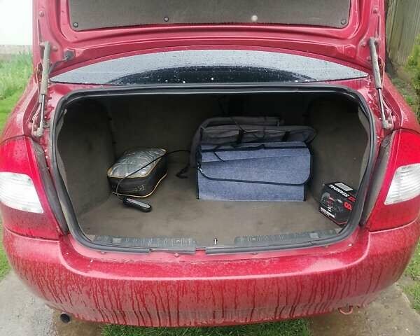 Красный ВАЗ Калина, объемом двигателя 1.6 л и пробегом 238 тыс. км за 2200 $, фото 12 на Automoto.ua