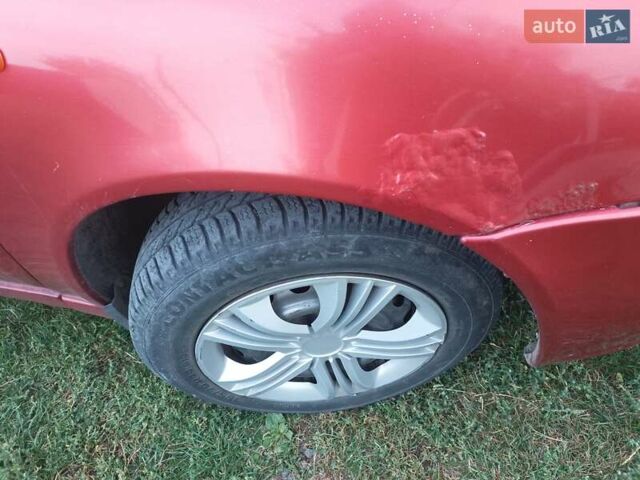 Красный ВАЗ Калина, объемом двигателя 1.6 л и пробегом 120 тыс. км за 1800 $, фото 24 на Automoto.ua