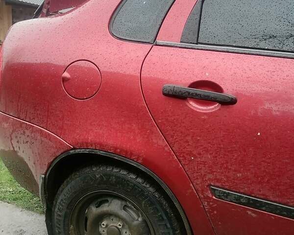 Красный ВАЗ Калина, объемом двигателя 1.6 л и пробегом 238 тыс. км за 2200 $, фото 6 на Automoto.ua