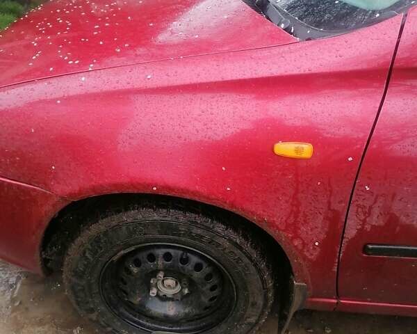 Красный ВАЗ Калина, объемом двигателя 1.6 л и пробегом 238 тыс. км за 2200 $, фото 9 на Automoto.ua