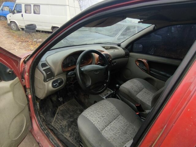 Красный ВАЗ Калина, объемом двигателя 1.6 л и пробегом 130 тыс. км за 1000 $, фото 2 на Automoto.ua