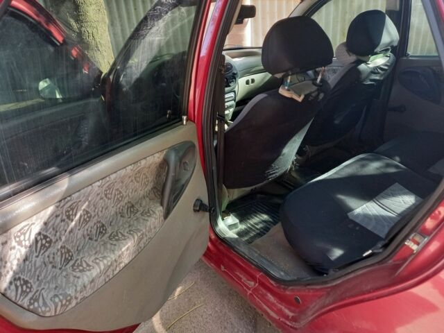 Красный ВАЗ Калина, объемом двигателя 1.6 л и пробегом 189 тыс. км за 1300 $, фото 4 на Automoto.ua