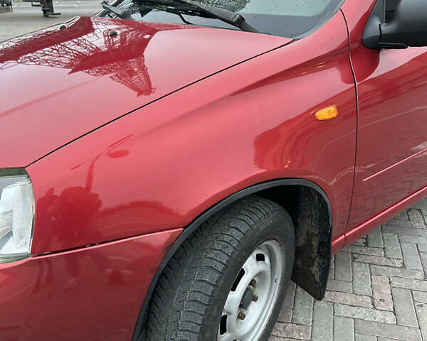 Красный ВАЗ Калина, объемом двигателя 1.6 л и пробегом 281 тыс. км за 2199 $, фото 21 на Automoto.ua