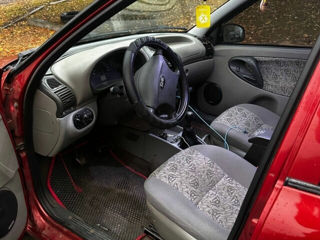 Красный ВАЗ Калина, объемом двигателя 1.6 л и пробегом 150 тыс. км за 2200 $, фото 7 на Automoto.ua