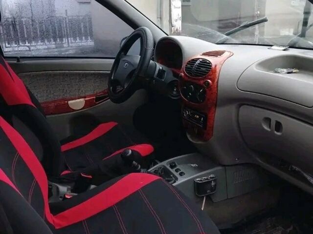 Красный ВАЗ Калина, объемом двигателя 1.6 л и пробегом 270 тыс. км за 1250 $, фото 6 на Automoto.ua