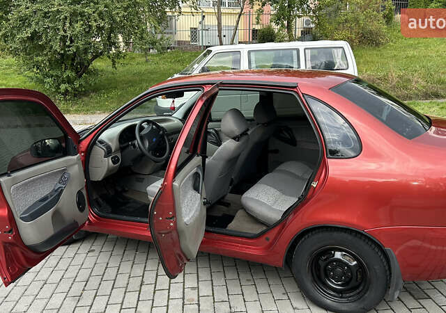 Красный ВАЗ Калина, объемом двигателя 1.6 л и пробегом 57 тыс. км за 2350 $, фото 8 на Automoto.ua