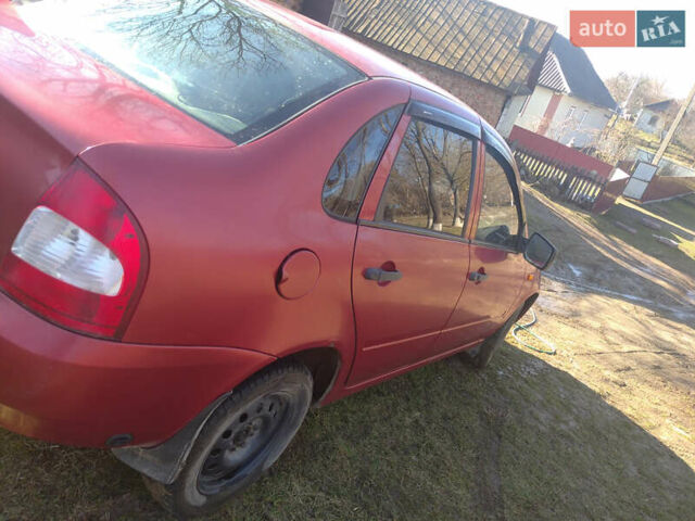 Красный ВАЗ Калина, объемом двигателя 1.6 л и пробегом 160 тыс. км за 2058 $, фото 3 на Automoto.ua