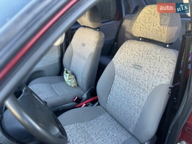 Красный ВАЗ Калина, объемом двигателя 1.6 л и пробегом 170 тыс. км за 1490 $, фото 11 на Automoto.ua