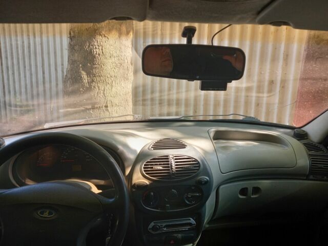 Красный ВАЗ Калина, объемом двигателя 1.6 л и пробегом 189 тыс. км за 1300 $, фото 6 на Automoto.ua