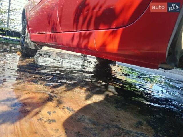 Красный ВАЗ Калина, объемом двигателя 1.6 л и пробегом 233 тыс. км за 1800 $, фото 6 на Automoto.ua
