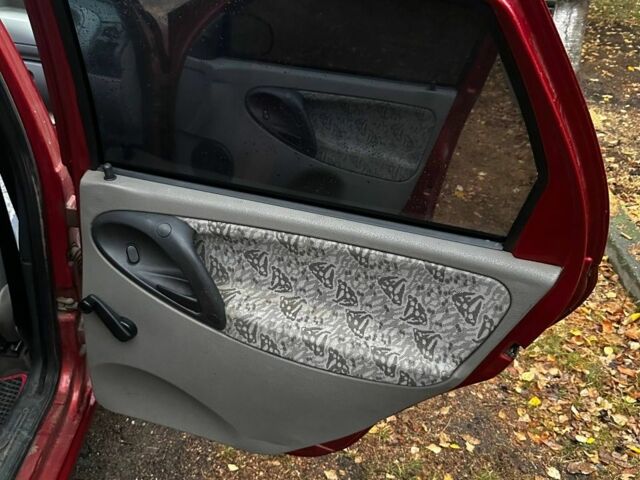 Красный ВАЗ Калина, объемом двигателя 1.6 л и пробегом 150 тыс. км за 2200 $, фото 14 на Automoto.ua