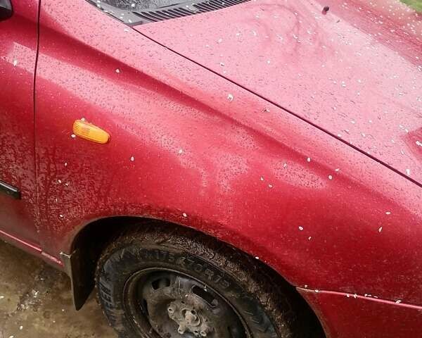 Красный ВАЗ Калина, объемом двигателя 1.6 л и пробегом 238 тыс. км за 2200 $, фото 8 на Automoto.ua